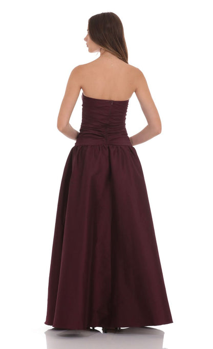 Lucy In The Sky Cutout Drop Waist Strapless Maxi Dress in Wine