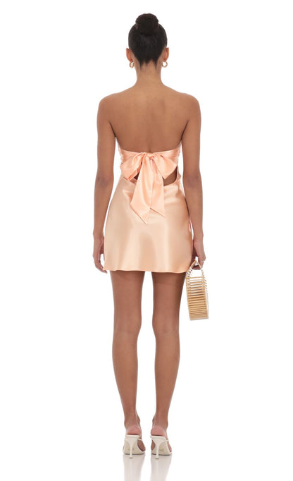 Lucy In The Sky Satin Strapless Twist Cutout Dress in Peach