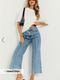 Showpo Jolene Jeans - Mid Rise Wide Leg Recycled Denim Cropped Jeans in Mid Blue Wash