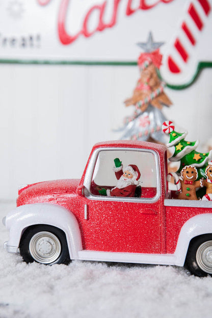 Decorator's Warehouse 11.5” B/O Lighted Water Globe Red Truck with Gingerbread Family